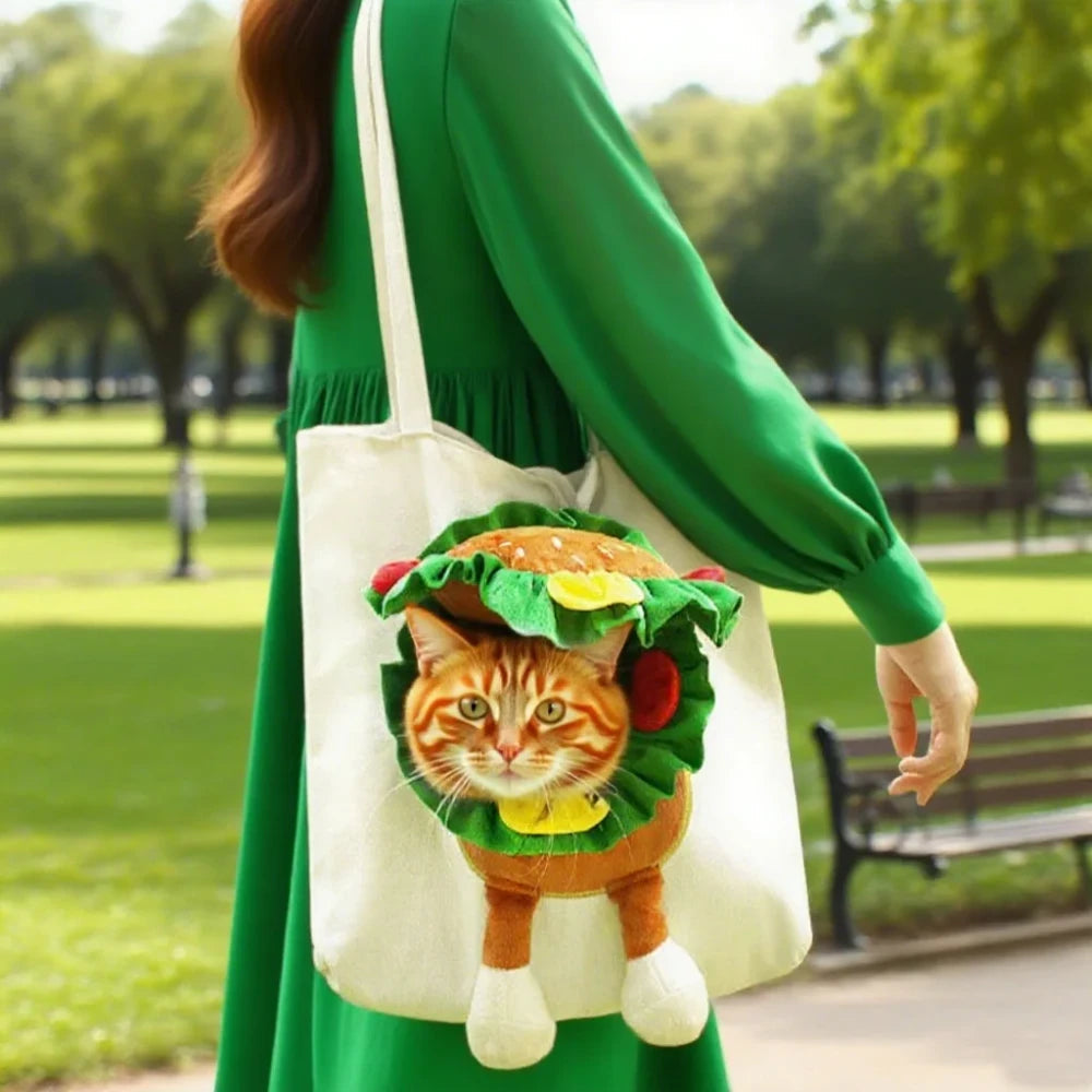 Kitten in a playful pet carrier during a park walk