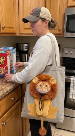 Happy cat owner using the lion carrier